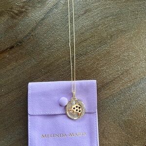 Melinda Maria jaguar medallion